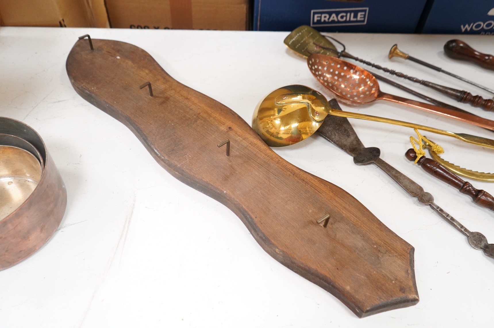 A 19th century toasting fork - longest 59cms, strainer spoons, etc